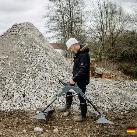 Técnico que utiliza un radar terrestre en un sitio de construcción
